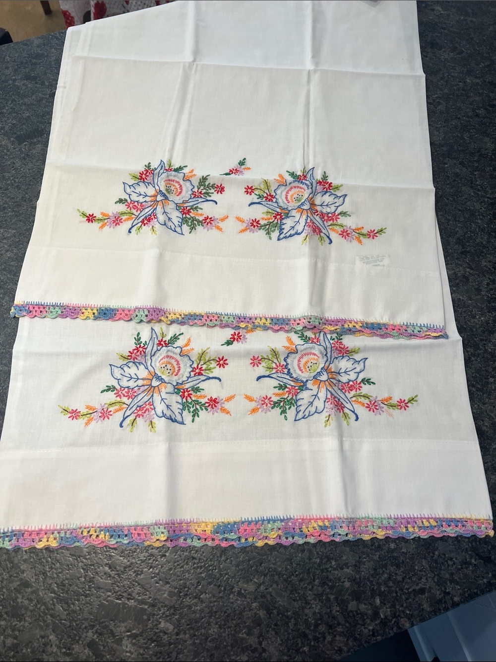 Hand-Embroidered White Pillowcases with Multicolor Floral Trim